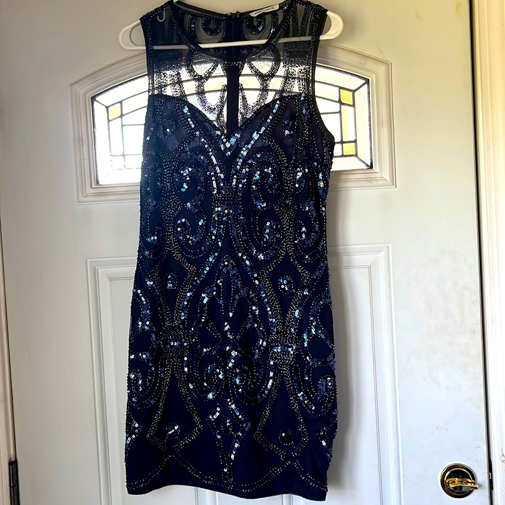 This dress is very flattering when worn!